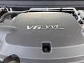 Close-up of a V6 engine cover with the text VVT DIRECT INJECTION on a 2018 Chevrolet Colorado