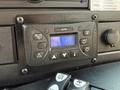 A control panel featuring buttons and a digital display showing 18 in a 2020 Chevrolet Express vehicle