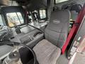 Interior of a 2006 E-One Typhoon fire truck featuring a driver's seat labeled Super Duty and a dashboard with controls and a cup holder