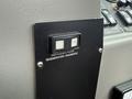 A control panel featuring a switch labeled "REGENERATION / DIAGNOSTIC" with a white and black button indicating the ON position