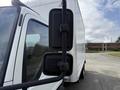 A 2008 International CityStar truck with prominent side mirrors reflecting its white body and a large cargo area
