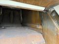 Interior view of a 2010 Autocar Xpeditor showing a rusted metal structure with no visible cargo or equipment