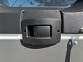 Close-up of a door handle on a 2020 RAM ProMaster 3500 with a gray and black finish