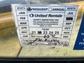 A safety inspection tag for a 2013 JCB 510-56 Loadall detailing maintenance and inspection dates as well as a signature and printed name