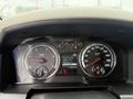 Dashboard of a 2011 Dodge Ram 5500 displaying gauges for RPM speed and fuel economy along with trip distance information