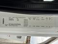 A 2021 Freightliner M2 106 specification label detailing manufacturer information vehicle weight and tire sizes