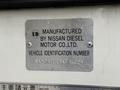 A metal identification plate for a 2009 UD Trucks UD 3300 showing manufacturing and vehicle identification details