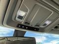 The overhead console of a 2019 Chevrolet Silverado 1500 features control buttons for lights and air vents along with LED lights