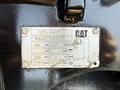 Metal identification plate of a 2022 Caterpillar 306 excavator displaying specifications and model information