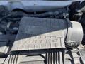 A Vortec engine cover from a 2013 Chevrolet Express detailing the brand and model of the engine component