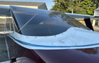 A close-up view of a 1986 Sorrell Hiperbipe SNS-7 amateur-built aircraft featuring a sleek fuselage and a transparent canopy