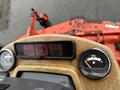 Dashboard controls of a 2012 Kubota F3680 featuring indicators for oil, battery, and a fuel gauge