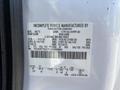 A 2016 Ford F-750 vehicle information label displaying specifications including weight capacity and manufacturing details