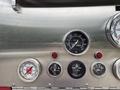 The dashboard of a 2002 GMC C7500 showing various gauges including fuel tachometer oil pressure and temperature indicators