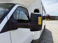A 2017 Chevrolet Express van is prominently displayed with a focus on its side mirror featuring a yellow indicator and the vehicle's sleek design