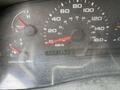 Dashboard of a 2002 Ford F-550 showing speedometer fuel gauge and odometer reading 373731 kilometers