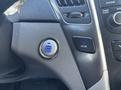 Engine start stop button and ECON button in a 2014 Hyundai Sonata interior dashboard controls
