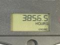 Digital display showing 3856.5 hours labeled with ENGINE