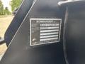 A label from a 2004 Bombardier SW48 showing model information and serial number with a black background