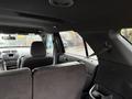 Interior view of a 2019 Ford Explorer showing the back seats and dashboard with multimedia controls and a console
