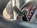 Close-up of the turn signal lever on a 2022 Freightliner M2 106 showing settings for off and flush functions