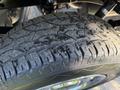 A close-up view of a treaded tire on a 2018 Ford F-150 showing detailed patterns and texture of the rubber surface