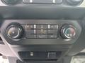Control panel of a 2020 Ford F-150 featuring climate controls for heating cooling and airflow settings