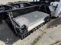 A 2022 Lion Lion6 electric vehicle battery pack is visible mounted on the chassis with visible connections and warning labels
