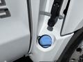 A blue cap for the diesel exhaust fluid reservoir on a 2020 Chevrolet Silverado