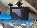 A 2012 Ford E-450 dashboard display screen showing a camera feed with a blurry view