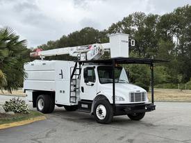 A 2021 Freightliner M2 106 bucket truck with a white body and an elevated boom arm for lifting and accessing overhead work