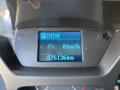 Digital dashboard display showing PRNDM gear selection indicator speed reading in km/h and odometer reading of 076136 km