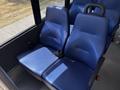 Two blue fabric seats designed for a van with safety belts and a simple ergonomic design
