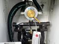 A mechanical assembly including hoses a brass valve and a pump system inside a cabinet
