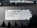 A 2019 GMC Savana vehicle emission control information label with details about compliance regulations and vehicle classification