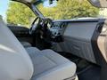 Interior view of a 2012 Ford F-350 SD showing seats dashboard and controls