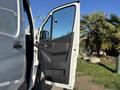 A 2024 Mercedes-Benz Sprinter 2500 with the driver's side door open showing the interior door panel and handle