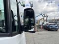 A 2020 Mercedes-Benz Sprinter 2500 with a side mirror visible focused on its reflective surface and sleek design