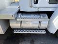 A 2009 Kenworth T270 featuring a polished aluminum fuel tank with a ladder-style step on the side for easy access