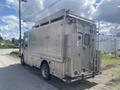 A 2007 Morgan Olson Workhorse W42 vehicle with a metallic exterior features side access doors and a rear-mounted equipment compartment