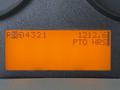 The display screen of a 2010 International 4300 truck showing the gear position as R and PTO hours as 1212.6