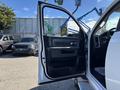 The image shows the open driver's side door of a 2014 RAM 5500 truck displaying the interior handle and controls