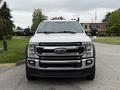 2020 Ford F-550 truck in front view showcasing its distinctive grille headlights and robust design