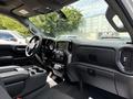 Interior view of a 2019 Chevrolet Silverado 1500 showcasing the dashboard center console and steering wheel