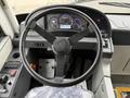 The image shows the steering wheel and dashboard of a 2016 Grande West Vicinity bus with various gauges and controls visible