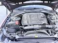 2020 Jaguar XE engine with exposed components including air intake and battery located on the left side