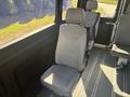 A single gray seat in the interior of a 2020 RAM ProMaster 3500 van with seatbelt attached and a minimalistic design