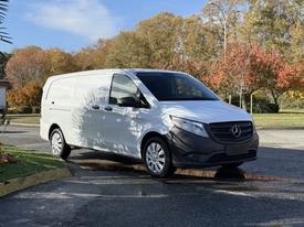 2020 Mercedes-Benz Metris in white with a cargo van design featuring a sleek front grille and sliding side door