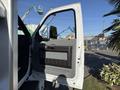 A 2017 Ford F-650 Super Duty with an open driver's door showcasing the interior handle and panel design