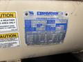 A metal nameplate displaying specifications for a 2005 Katolight SED60FPJ4 synchronous AC generator including model serial frame and electrical ratings